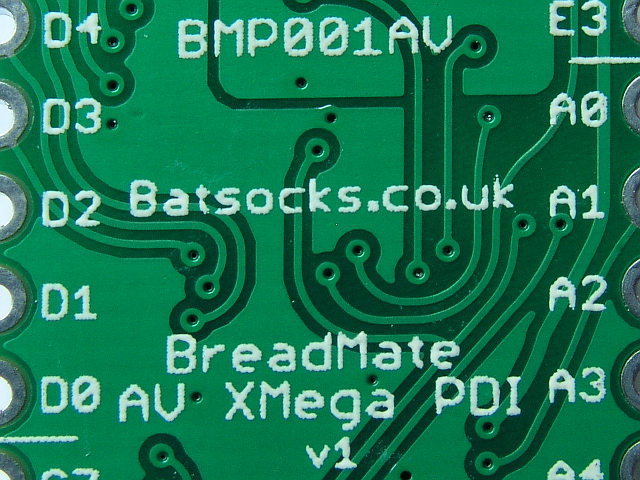 Closeup of the XMega32A4U's pins